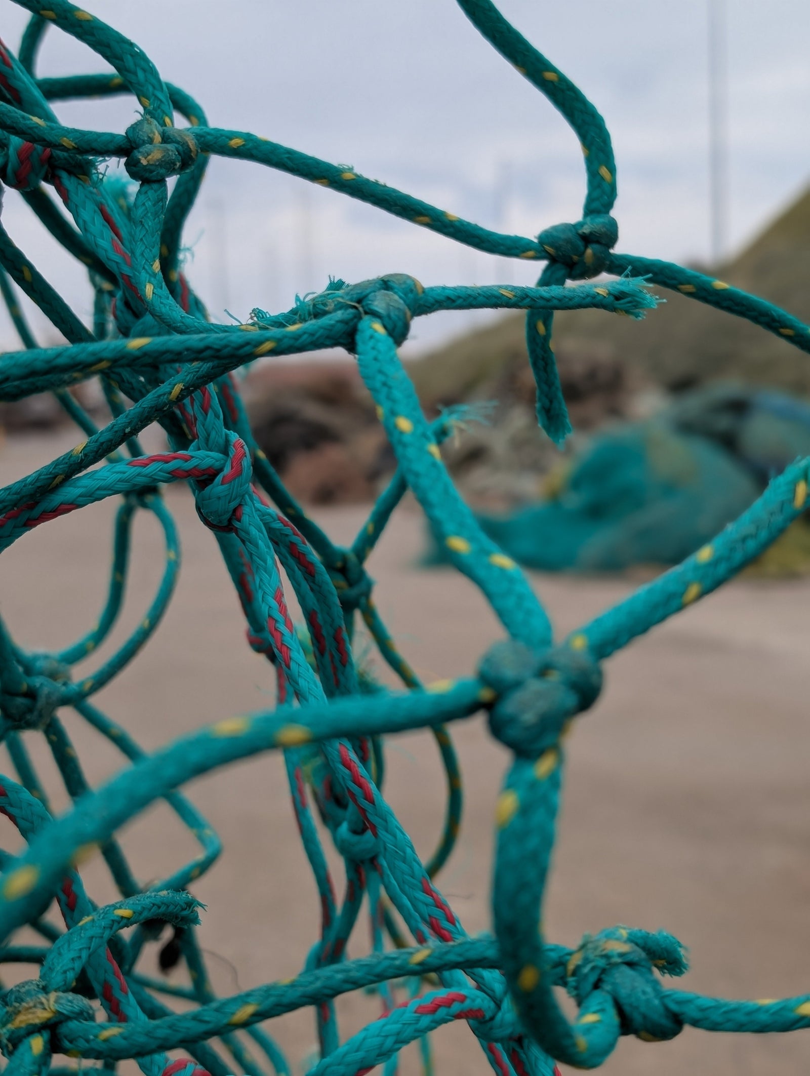Close-up of the Wehlers R.U.M. chair illustrating the scalability of using 100% recycled marine litter to create circular office furniture.
